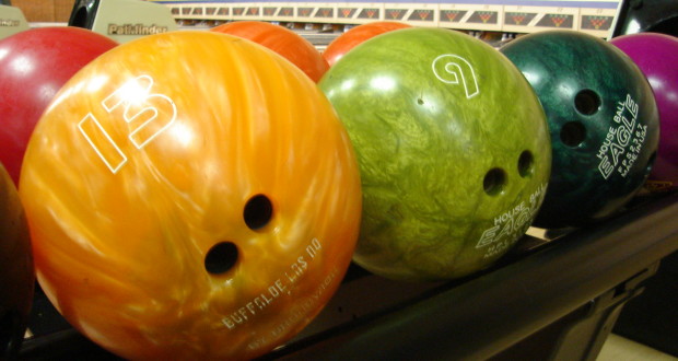 bowling balls on ball holder multiple colors of balls standard sizes for bowling balls