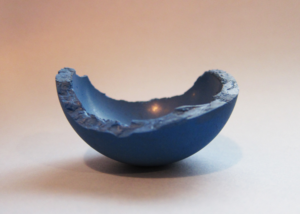 broken blue handball torn in half broken ball