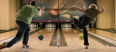 male on left female on right bowling at the the same time basic equipment for bowling bowling ball 10 bowling pins