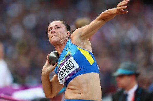 women with a shot put ball basic equipment for shot put iron ball or brass ball