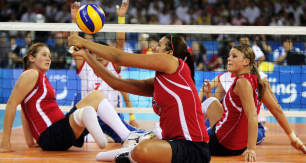 girls playing sitting volleyball this is a basic standard equipment with volleyball