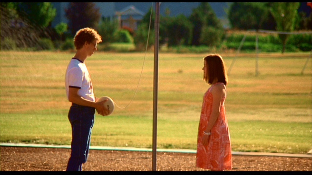 napoleon dynamite playing tetherball yellow ball on a string hanging off a pole