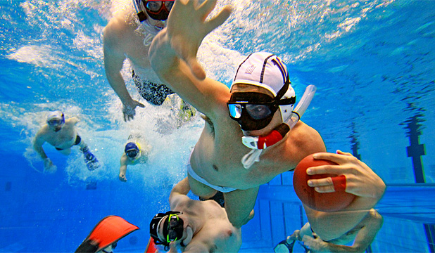 mens water polo 6 men playing water polo with snorkeling gear regulated equipment for water polo